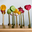 bamboo pick board featuring close-up of veggies skewered on toothpicks